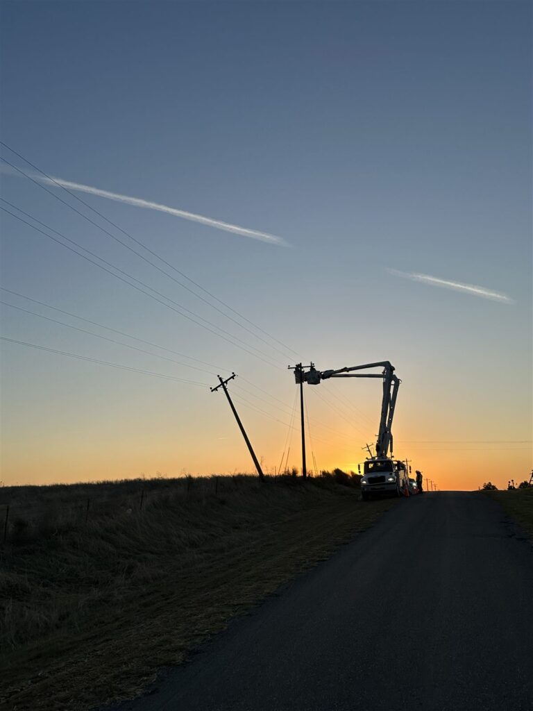 Bucket truck at sunset on a utility construction project in the Texas Panhandle