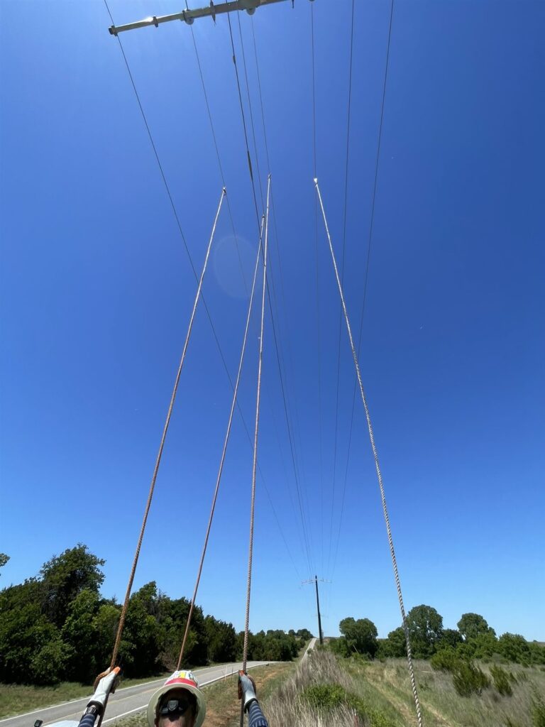 Transmission conductors strung across a utility right-of-way