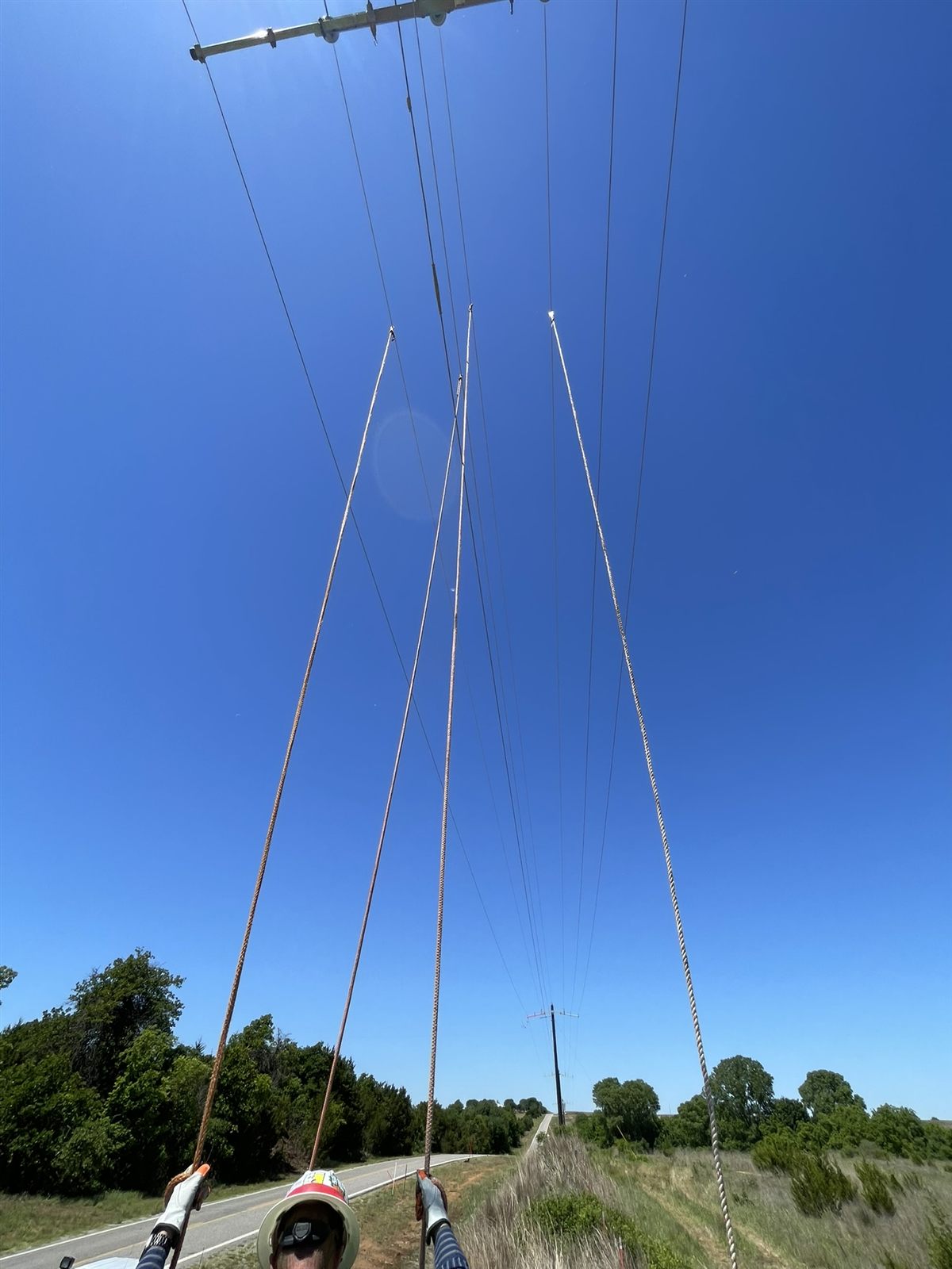 Transmission conductors strung across a utility right-of-way